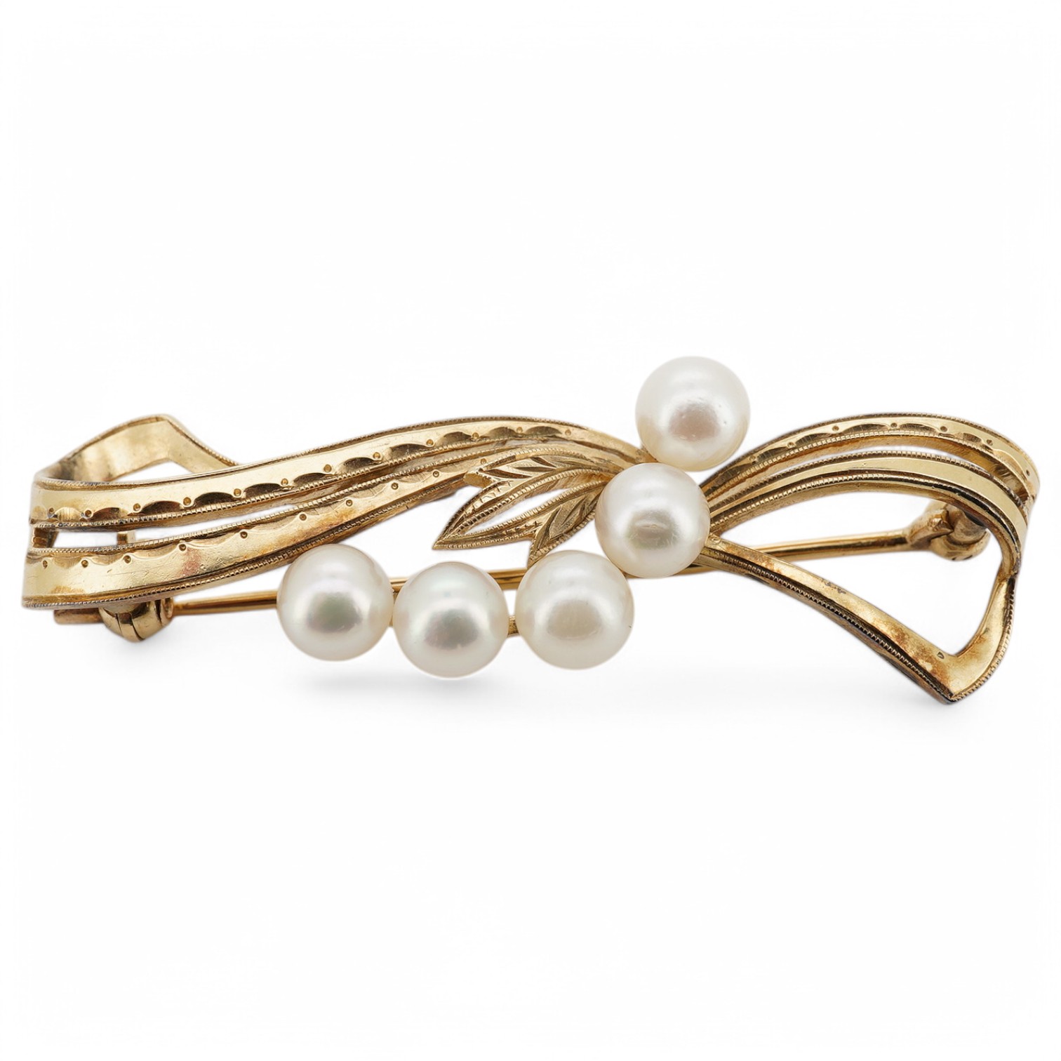 A Mikimoto 14k and five stone cultured pearl set foliate bow brooch, 44mm, gross weight 5.8 grams. Condition - good